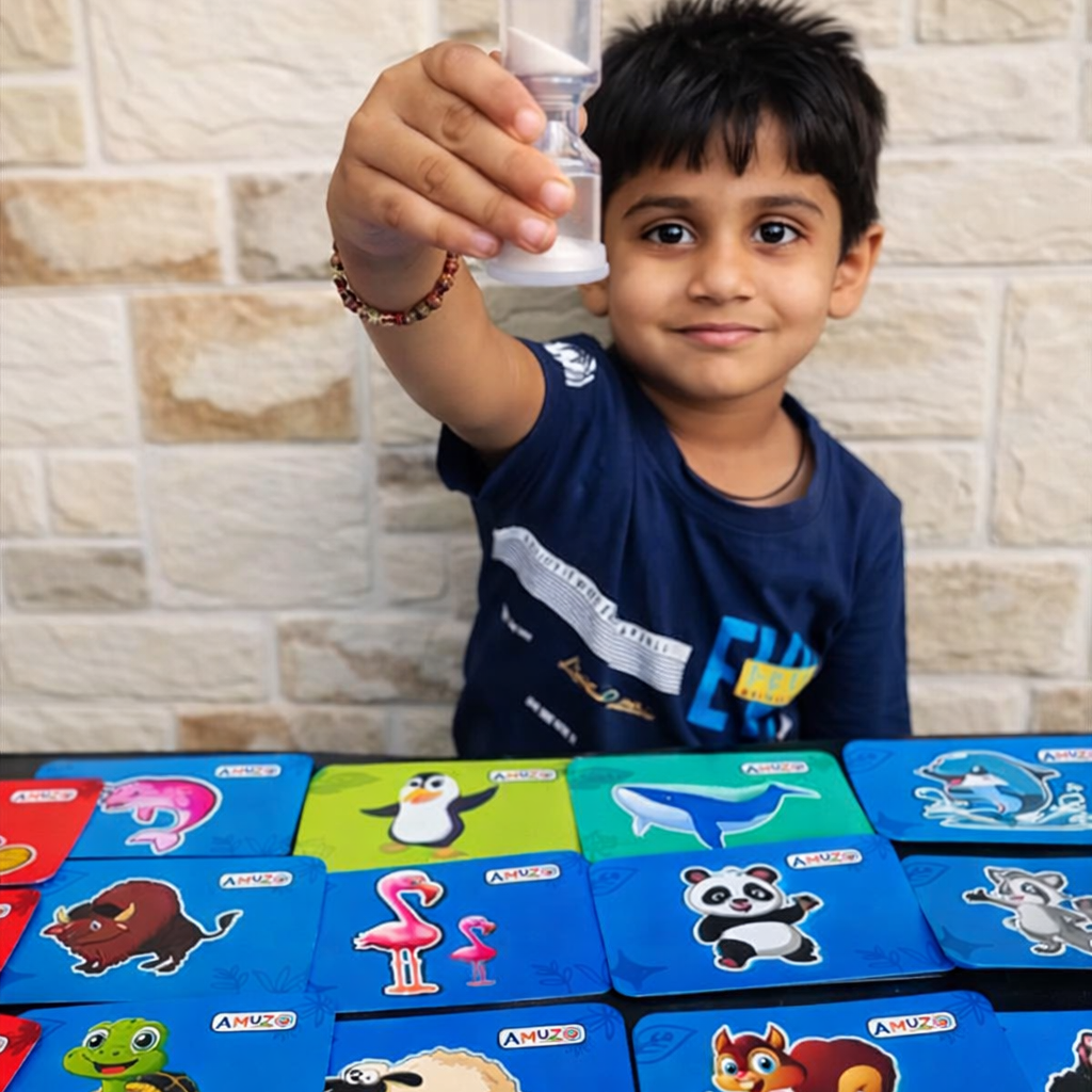 Child holding a small container above a set of colorful boxes with animal illustrations.